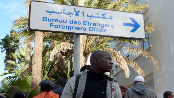 A sub-Saharan African immigrant queues outside the governor's office in Rabat on January 2, 2014 as Morocco launched an operation to give residency permits to tens of thousands of immigrants living in the country illegally. The government in November 2013 unveiled what it called an "exceptional operation" to give official papers to some of the 25,000-40,000 sub-Saharans estimated to be residing illegally in Morocco. AFP PHOTO / FADEL SENNA / AFP PHOTO / FADEL SENNA